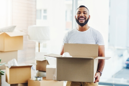 Moving Man holding a box