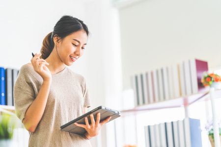Woman looking at her iPad