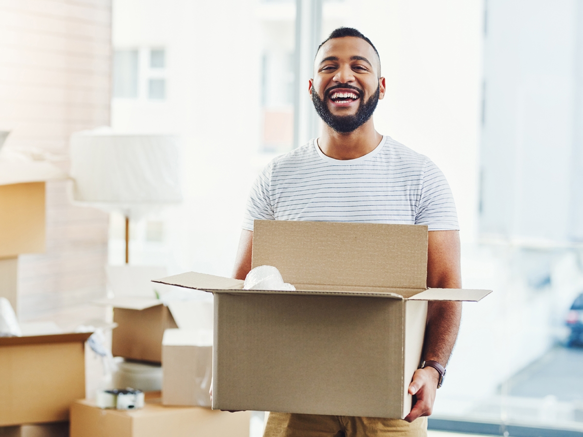 Moving Man holding a box