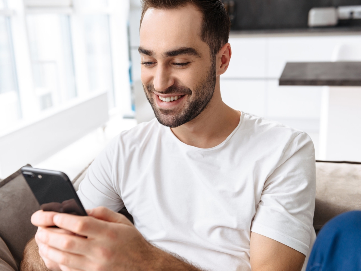 Young man using smart phone