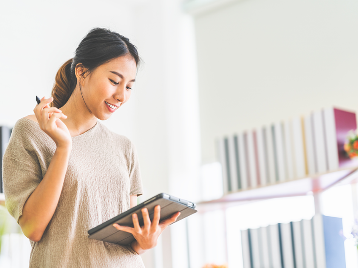 Woman looking at Ipad